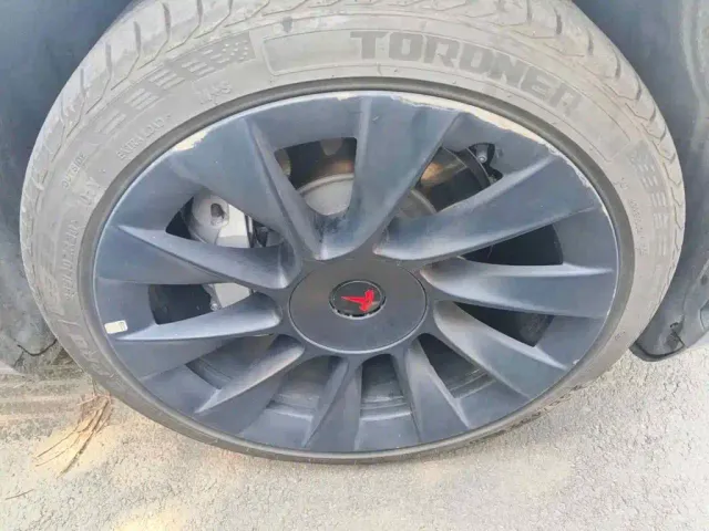 Tesla Model Y — Фото автомобиля 7