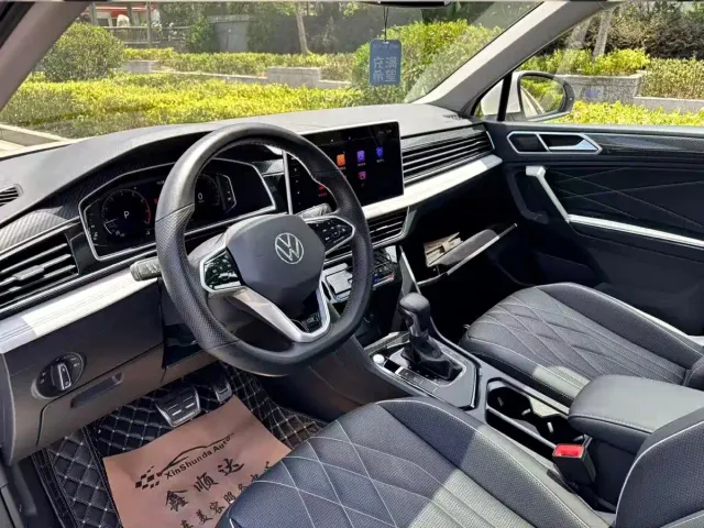 Volkswagen Tiguan L — Фото автомобиля 6