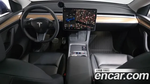Tesla Model Y — Фото автомобиля 10