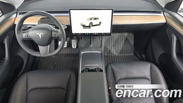 Tesla Model Y — Фото автомобиля 7