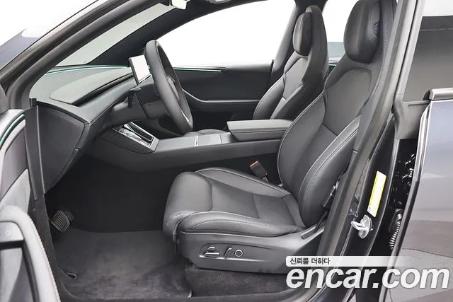 Tesla Model Y — Фото автомобиля 15