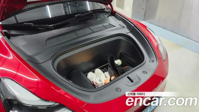 Tesla Model Y — Фото автомобиля 6
