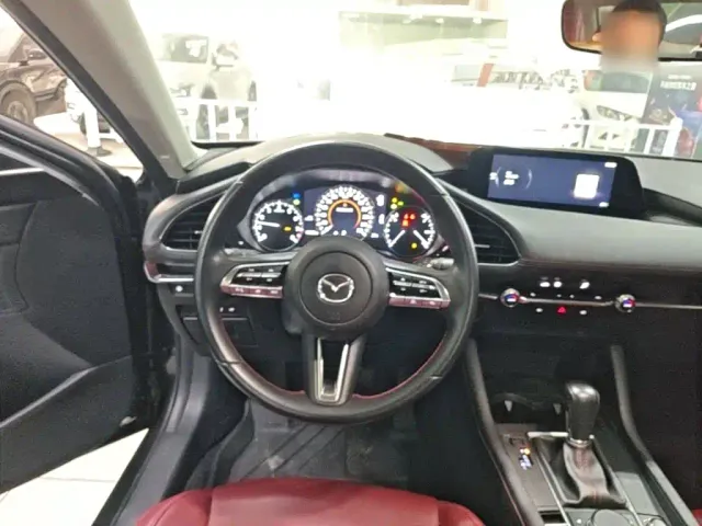 Mazda Axela — Фото автомобиля 10