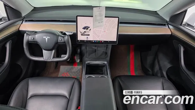Tesla Model Y — Фото автомобиля 7