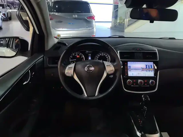 Nissan Tiida — Фото автомобиля 15