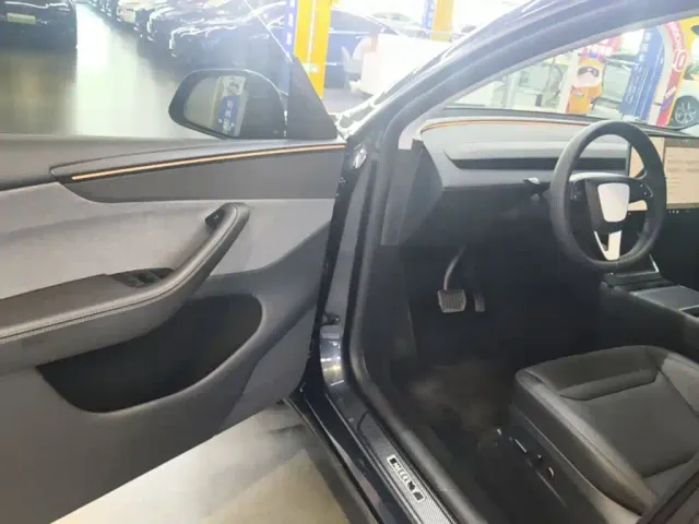 Tesla Model Y — Фото автомобиля 15
