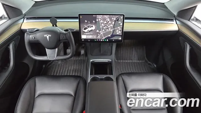 Tesla Model Y — Фото автомобиля 10