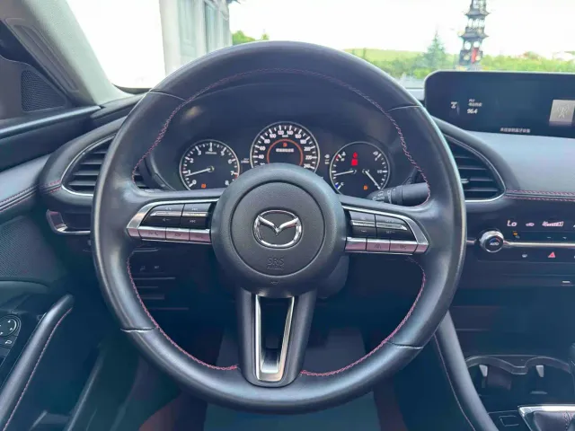 Mazda Axela — Фото автомобиля 15