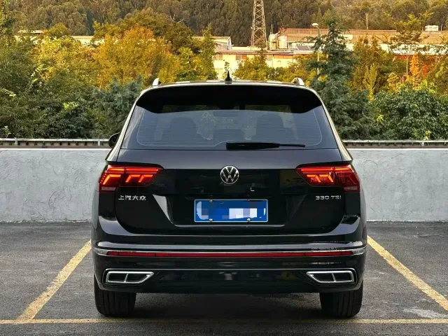 Volkswagen Tiguan L — Фото автомобиля 8