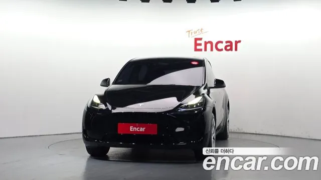 Tesla Model Y — Фото автомобиля 3