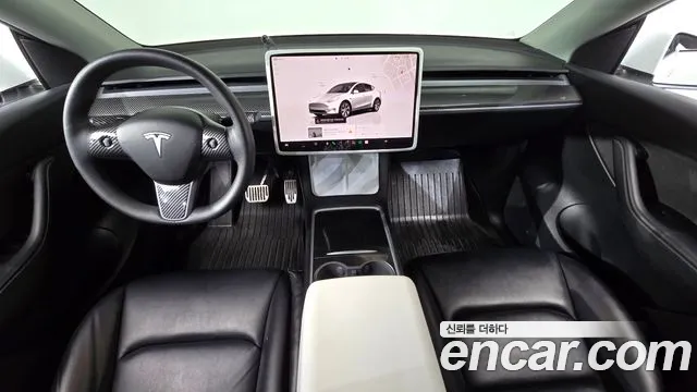 Tesla Model Y — Фото автомобиля 7