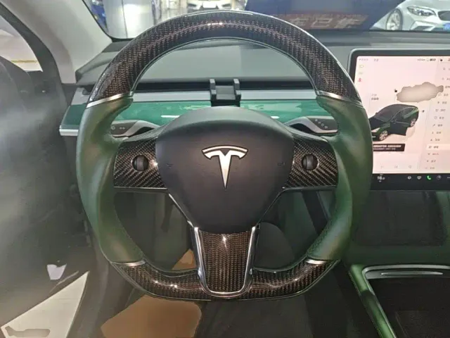 Tesla Model Y — Фото автомобиля 10