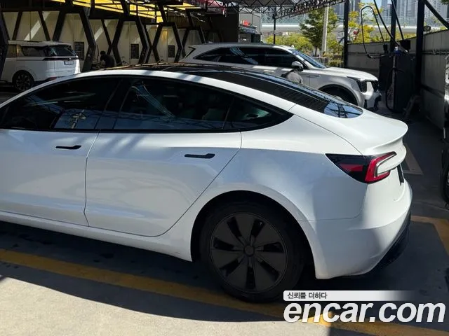 Tesla Model 3 — Фото автомобиля 2