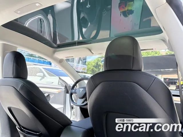 Tesla Model 3 — Фото автомобиля 6