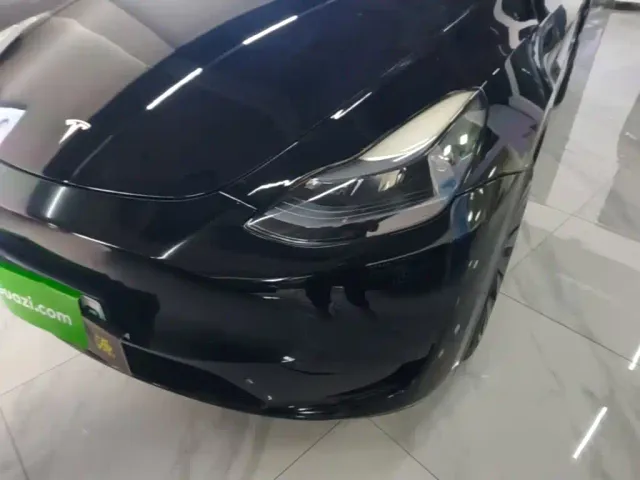 Tesla Model Y — Фото автомобиля 17
