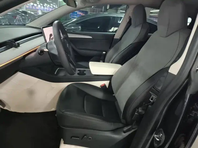 Tesla Model Y — Фото автомобиля 14
