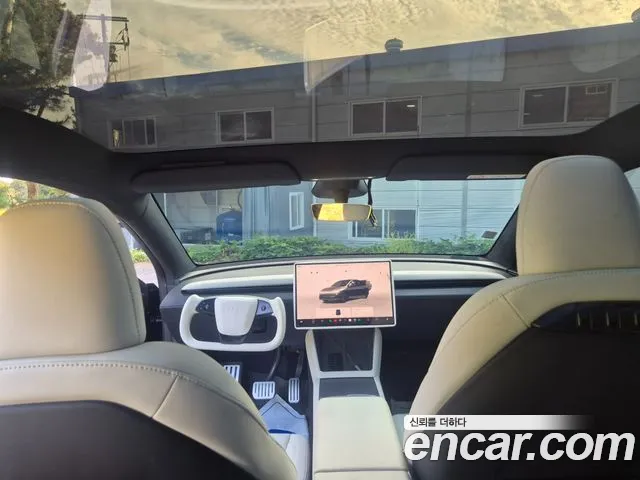 Tesla Model Y — Фото автомобиля 7
