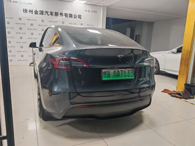 Tesla Model Y — Фото автомобиля 8