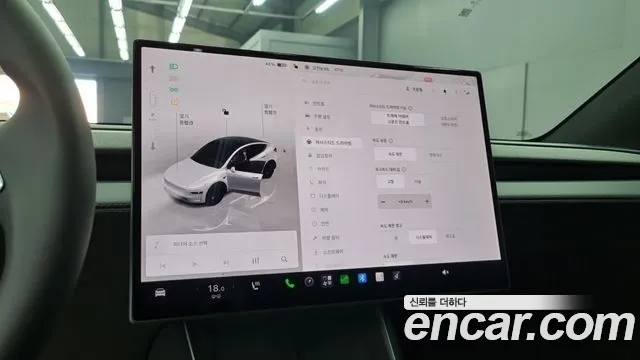 Tesla Model Y — Фото автомобиля 12