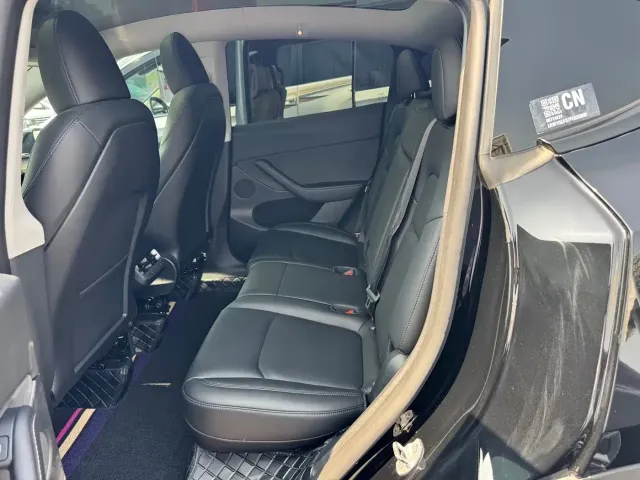 Tesla Model Y — Фото автомобиля 8