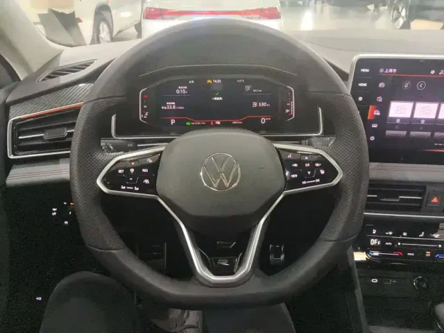 Volkswagen Tiguan L — Фото автомобиля 6