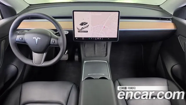 Tesla Model Y — Фото автомобиля 10