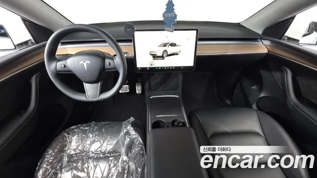 Tesla Model Y — Фото автомобиля 10
