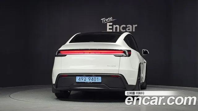 Tesla Model Y — Фото автомобиля 4