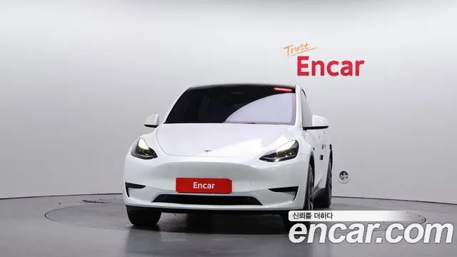 Tesla Model Y — Фото автомобиля 3