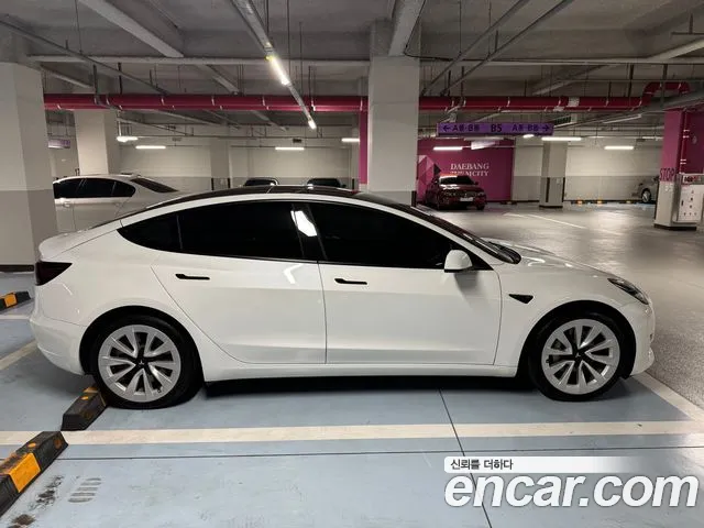 Tesla Model 3 — Фото автомобиля 9