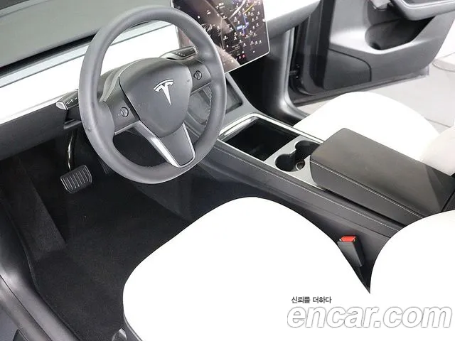 Tesla Model Y — Фото автомобиля 8