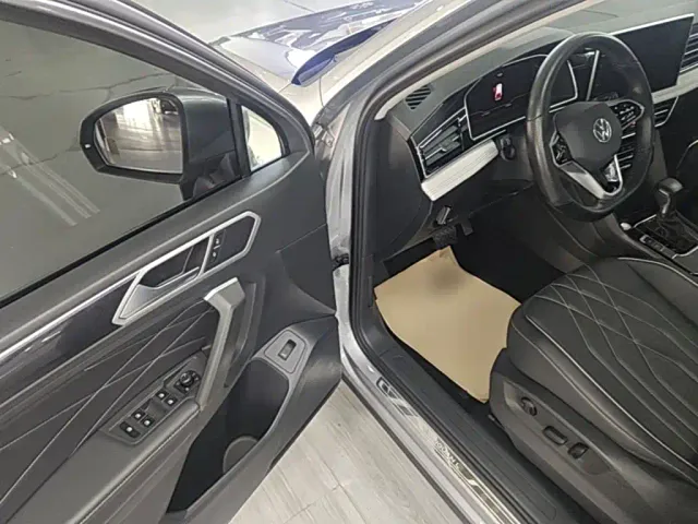Volkswagen Tiguan L — Фото автомобиля 15