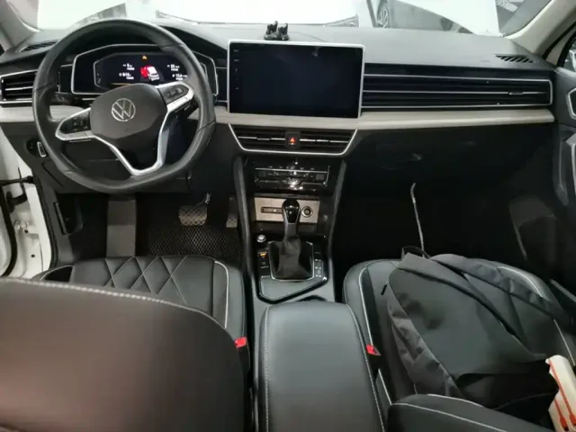 Volkswagen Tiguan L — Фото автомобиля 9