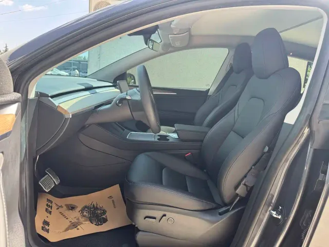 Tesla Model Y — Фото автомобиля 4