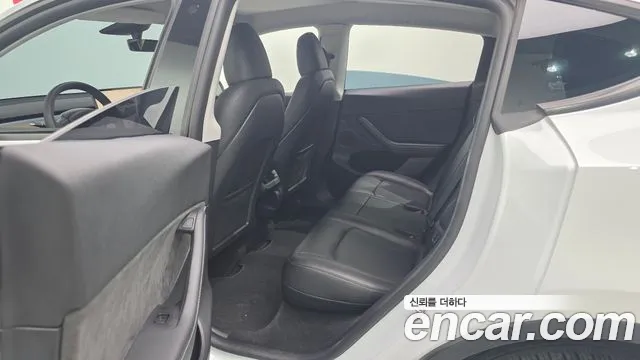 Tesla Model Y — Фото автомобиля 25