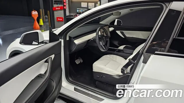 Tesla Model Y — Фото автомобиля 6
