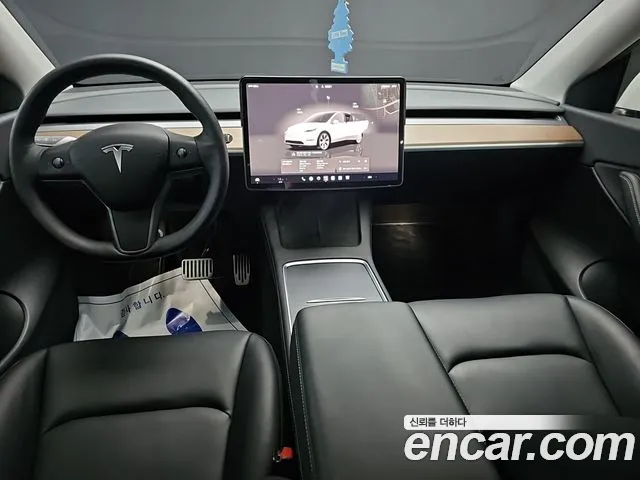Tesla Model Y — Фото автомобиля 7