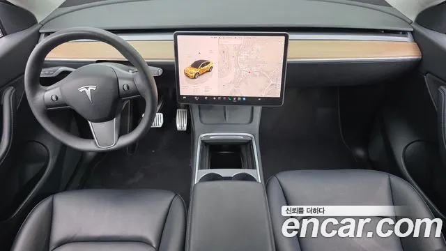 Tesla Model Y — Фото автомобиля 7