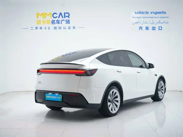 Tesla Model Y — Фото автомобиля 4