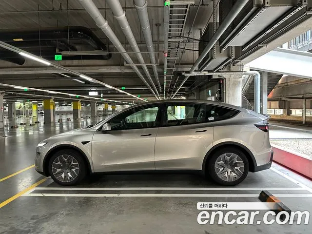 Tesla Model Y — Фото автомобиля 5