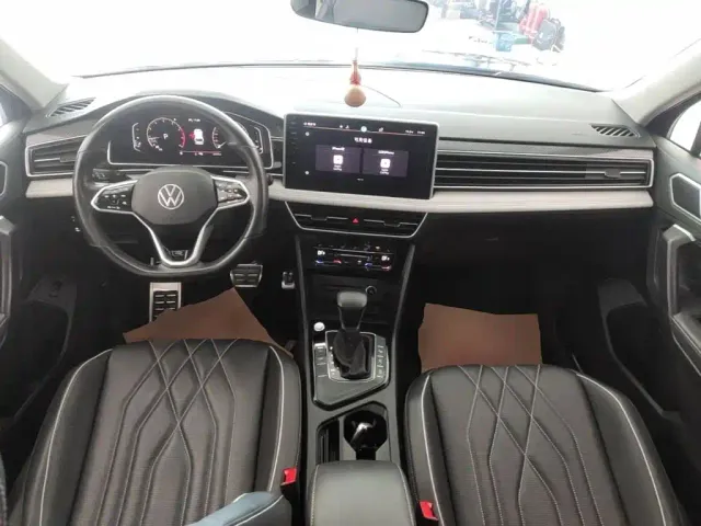Volkswagen Tiguan L — Фото автомобиля 9