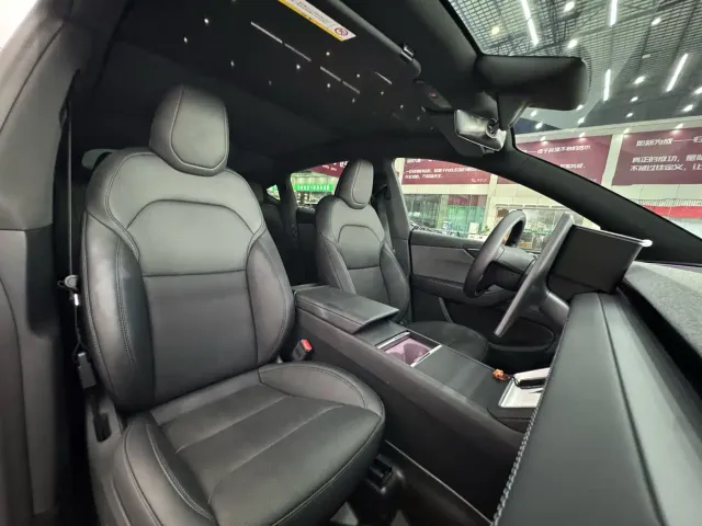 Tesla Model Y — Фото автомобиля 16