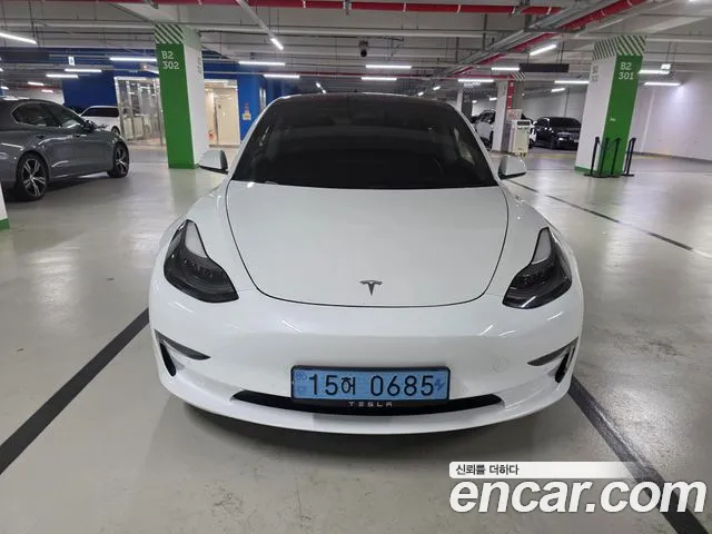 Tesla Model 3 — Фото автомобиля 2