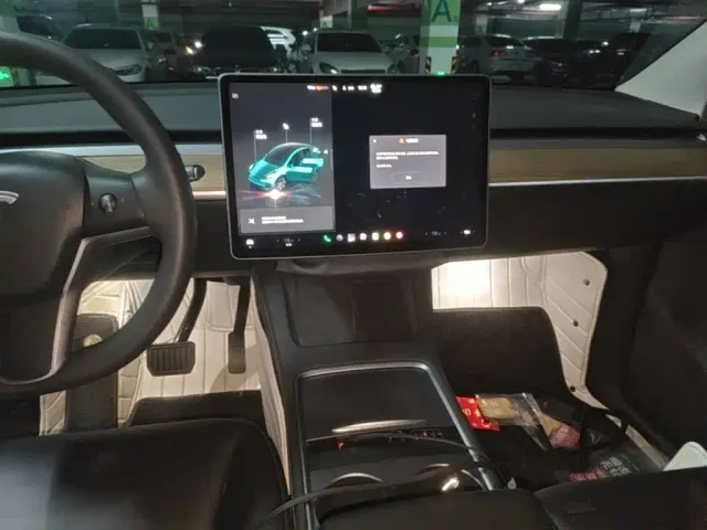 Tesla Model Y — Фото автомобиля 12