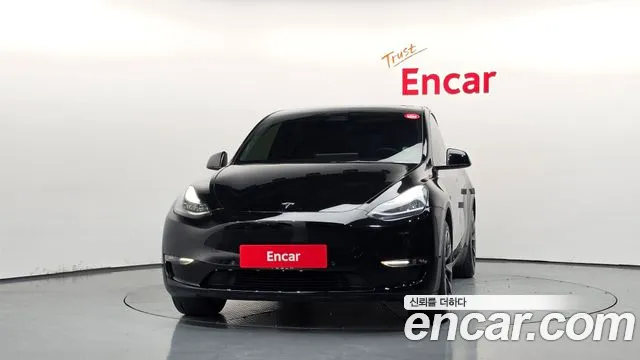 Tesla Model Y — Фото автомобиля 3