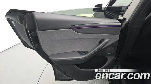Tesla Model Y — Фото автомобиля 14