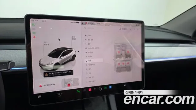 Tesla Model Y — Фото автомобиля 15
