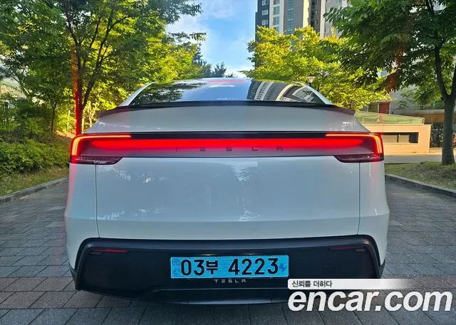 Tesla Model Y — Фото автомобиля 5