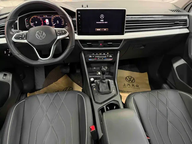 Volkswagen Tiguan L — Фото автомобиля 7