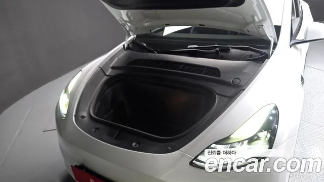 Tesla Model Y — Фото автомобиля 6